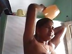 Indian girl taking self video when bathing